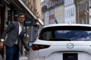 Man enjoys flexibility in Mazda's car finance options with repayments set to his pay cycle