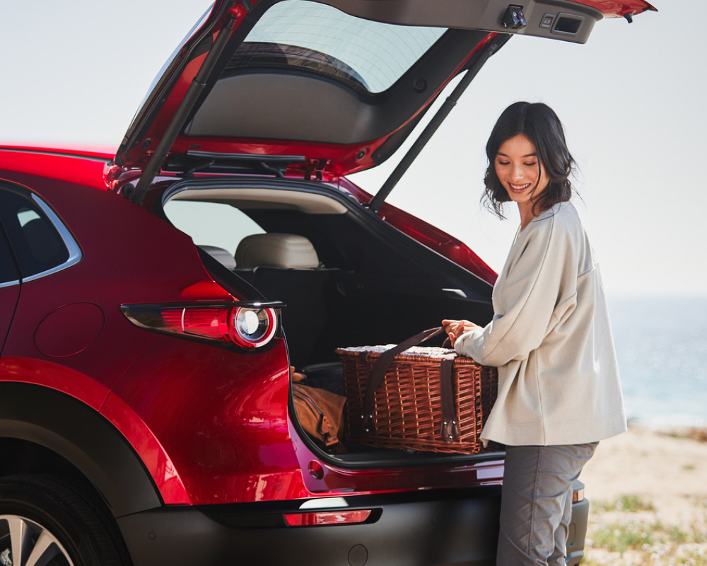 Woman enjoying flexibility with Mazda’s car finance options