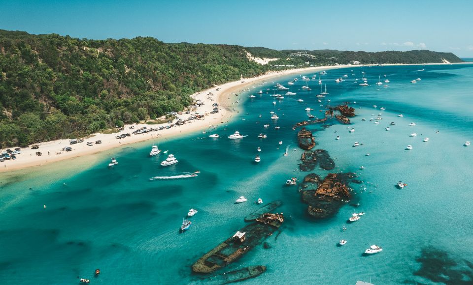 Aerial view of Moreton Island, Australia, featuring turquoise waters, sandy beaches and shipwrecks along one of the best 4WD tracks in Australia.